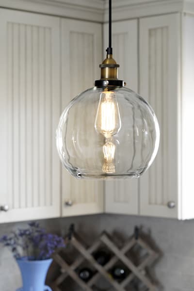 glass-globe-pendant-light-with-edison-bulb-in-kitchen