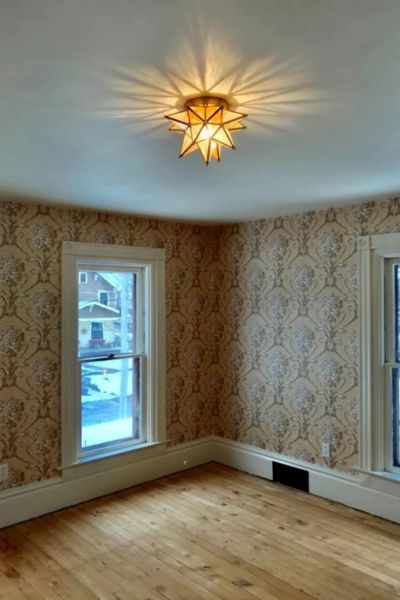gold-star-flush-mount-light-in-low-ceiling-room