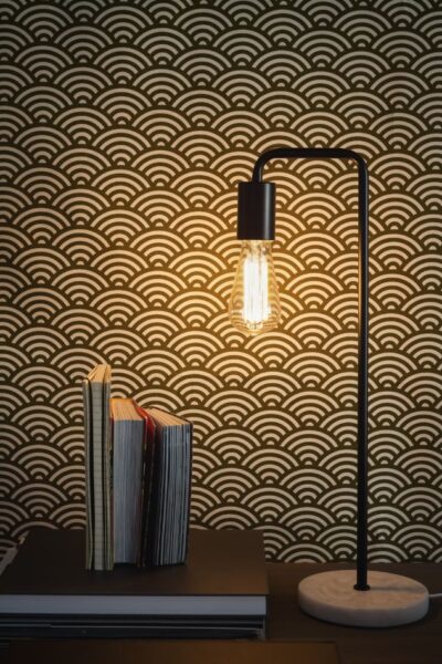 black-table-lamp-on-side-table-books